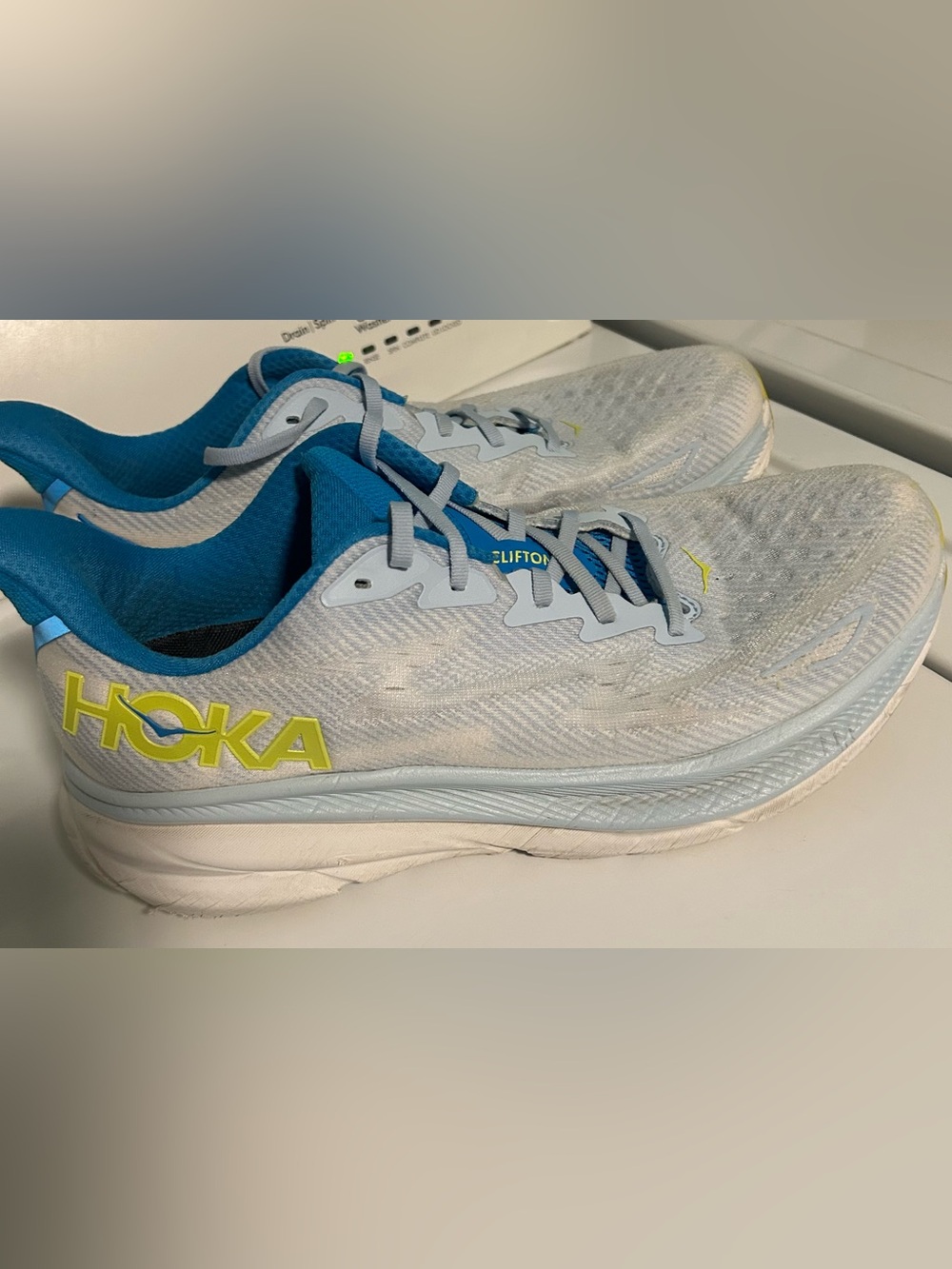 Hoka Clifton Men's Running Shoes — Light Gray with Blue and Yellow Accent